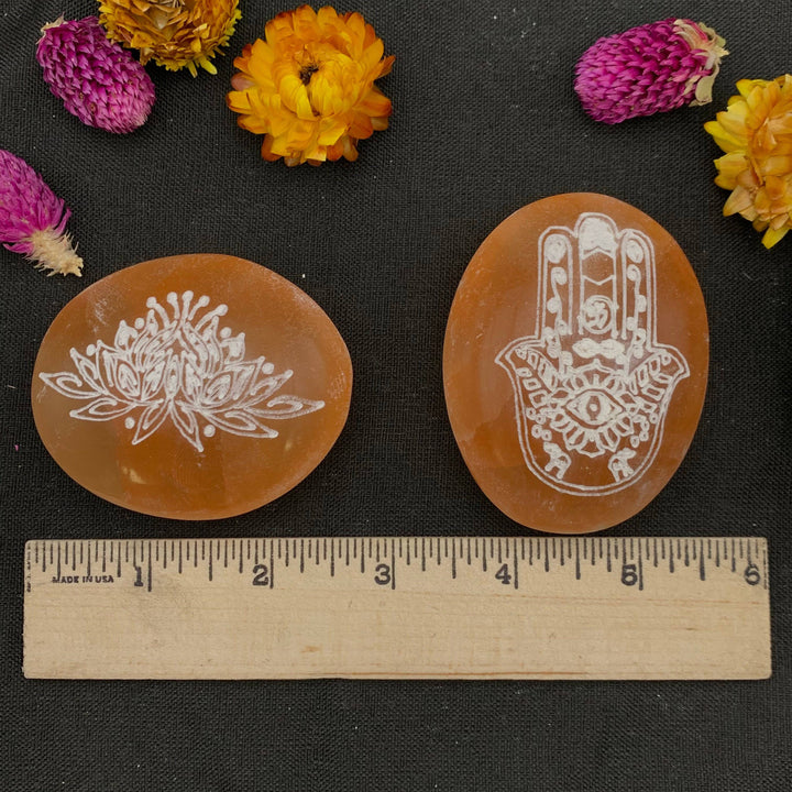 Peach Selenite Engraved Palmstone - Funky Stuff